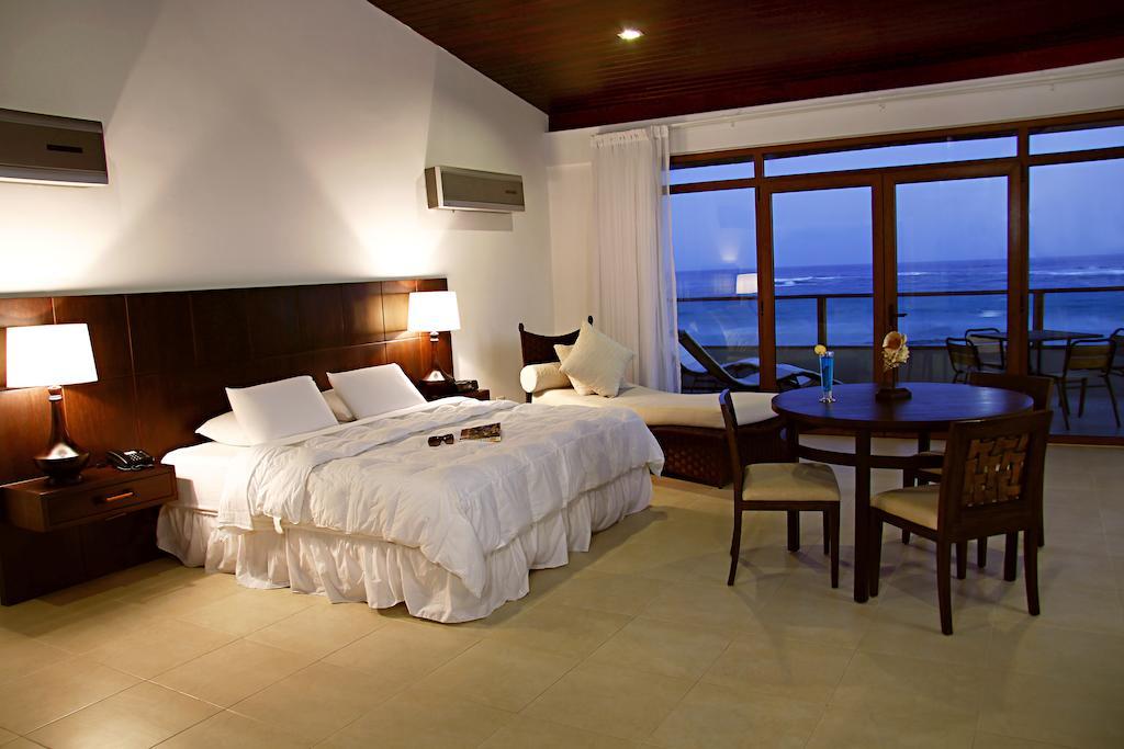 Iguana Crossing Boutique Hotel Puerto Villamil Camera foto