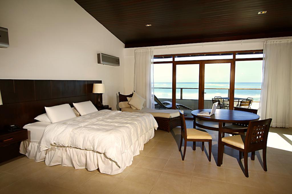 Iguana Crossing Boutique Hotel Puerto Villamil Camera foto