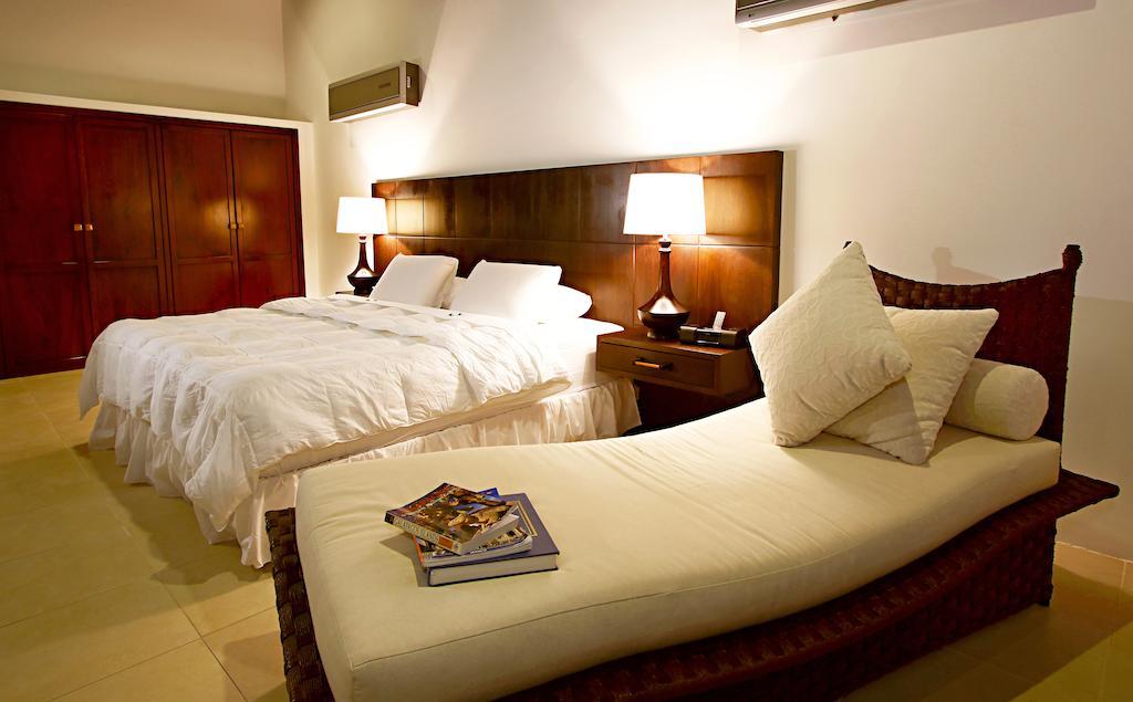 Iguana Crossing Boutique Hotel Puerto Villamil Camera foto